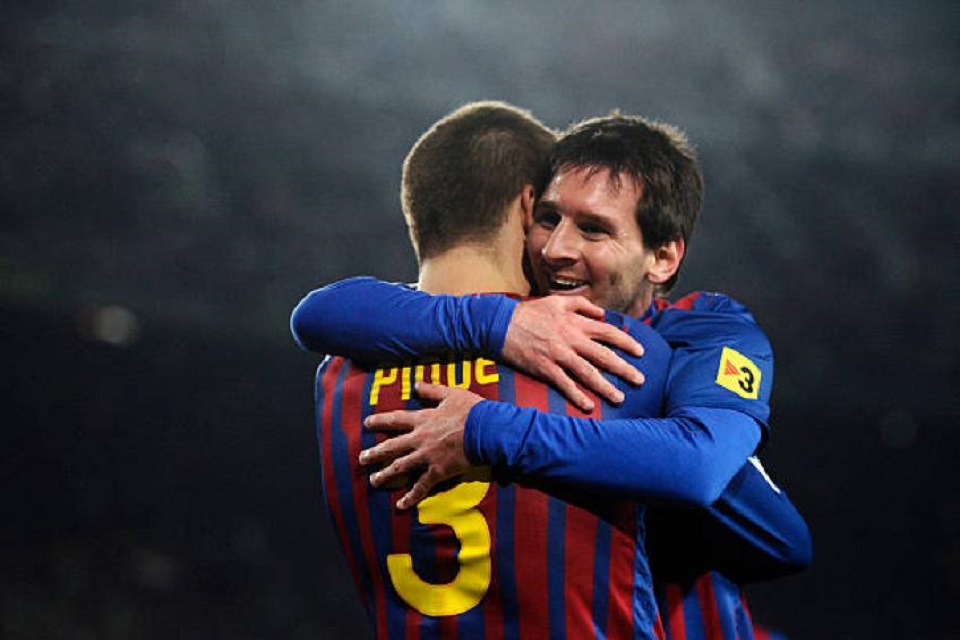 Lionel Messi dan Gerard Pique