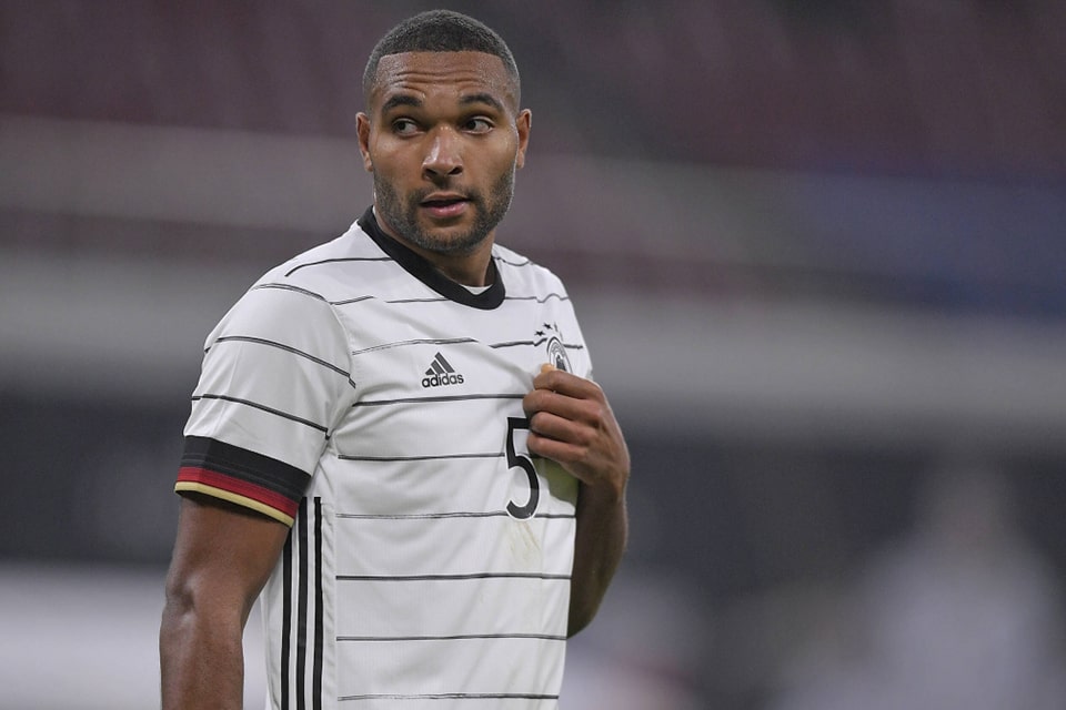  Jonathan Tah of the German national team in action during a match at the Euro 2024 European Championship alongside teammates Antonio Rudiger and Toni Kroos.
