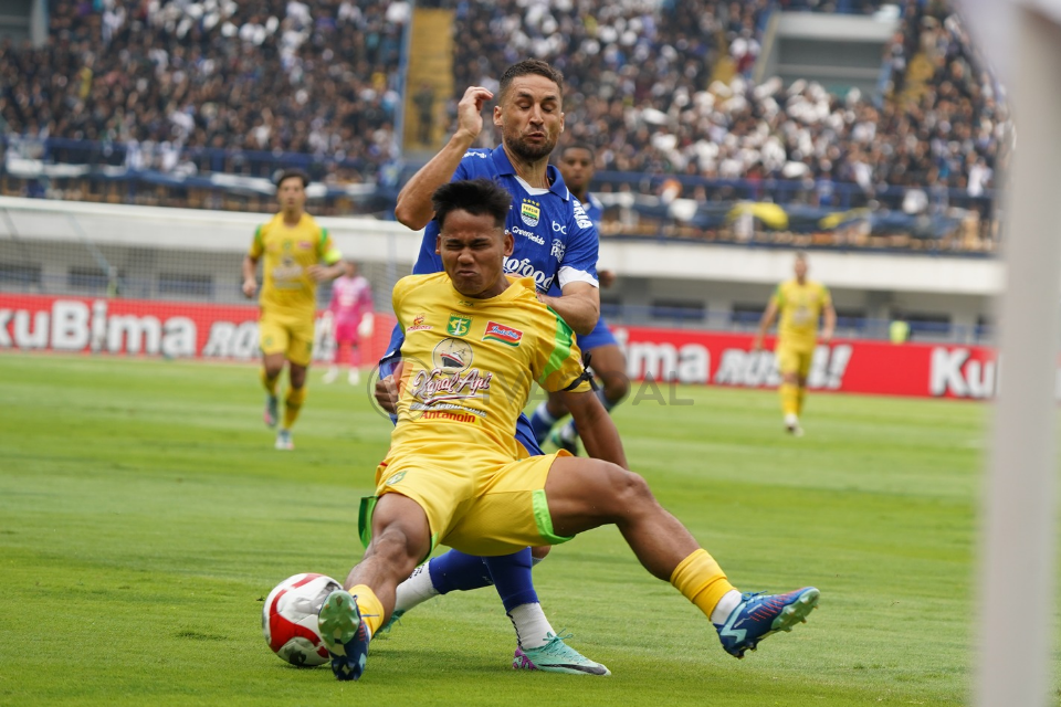 Toni Firmansyah dan Luciano Guaycochea.